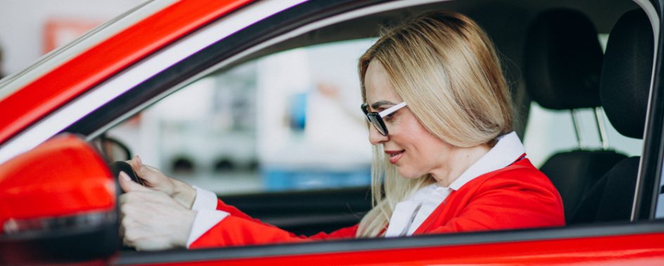 business-woman-sitting-new-car-car-showroom